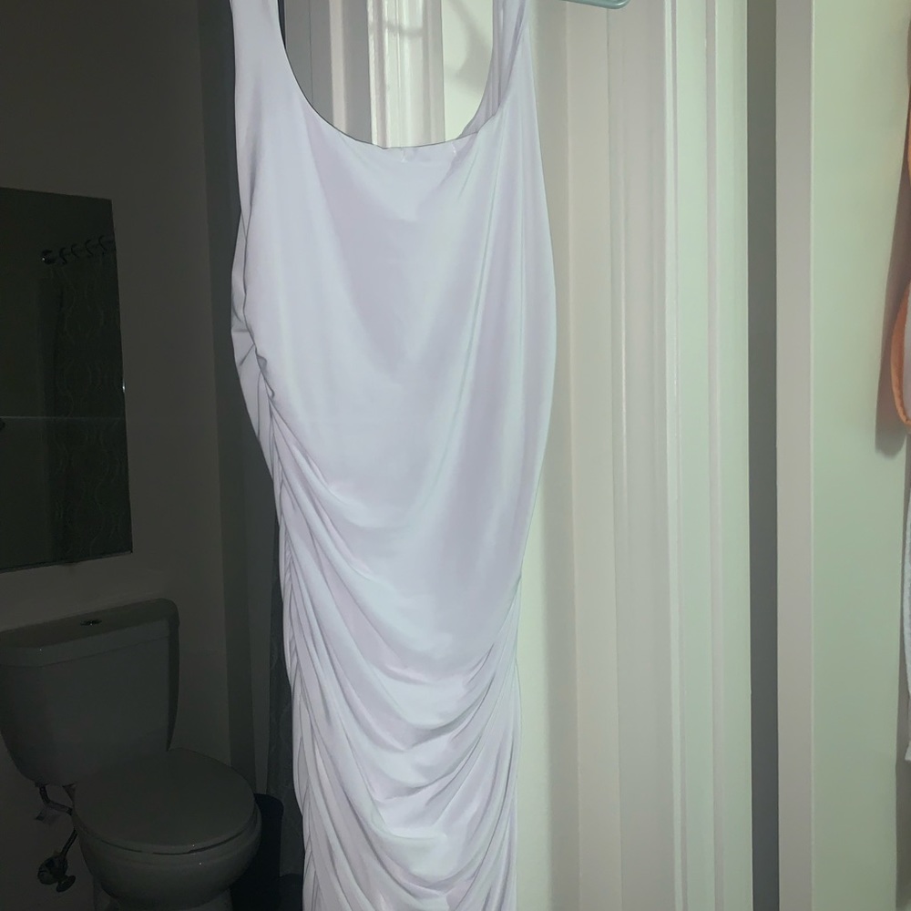 White mini bodycon dress.